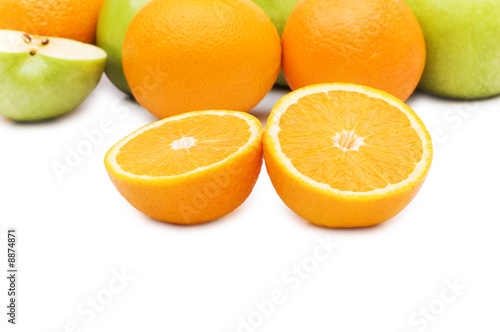 Apple and oranges isolated on the white background