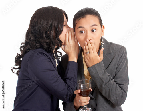 Canvas Print young employee murmuring to her colleague - shocked