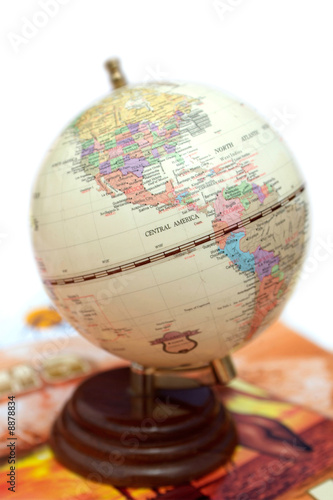 A globe on table on white background