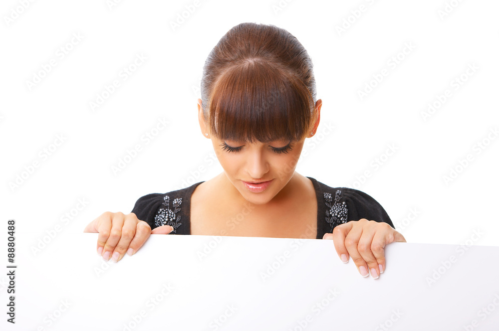 Beautiful business woman holding empty white board