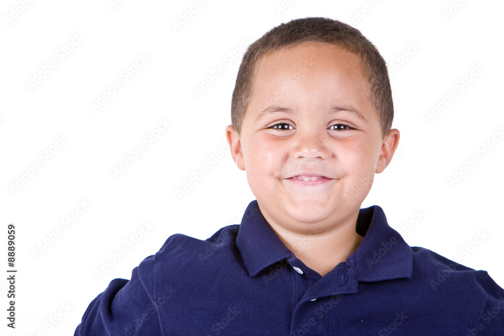 Happy mixed race boy looking forward on white background Happy mixed race boy looking forward on white background
