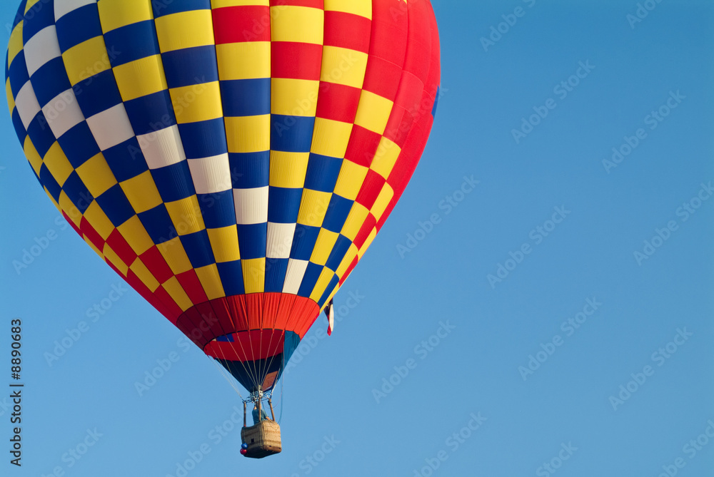 Fototapeta premium A colorful hot air balloon underway.