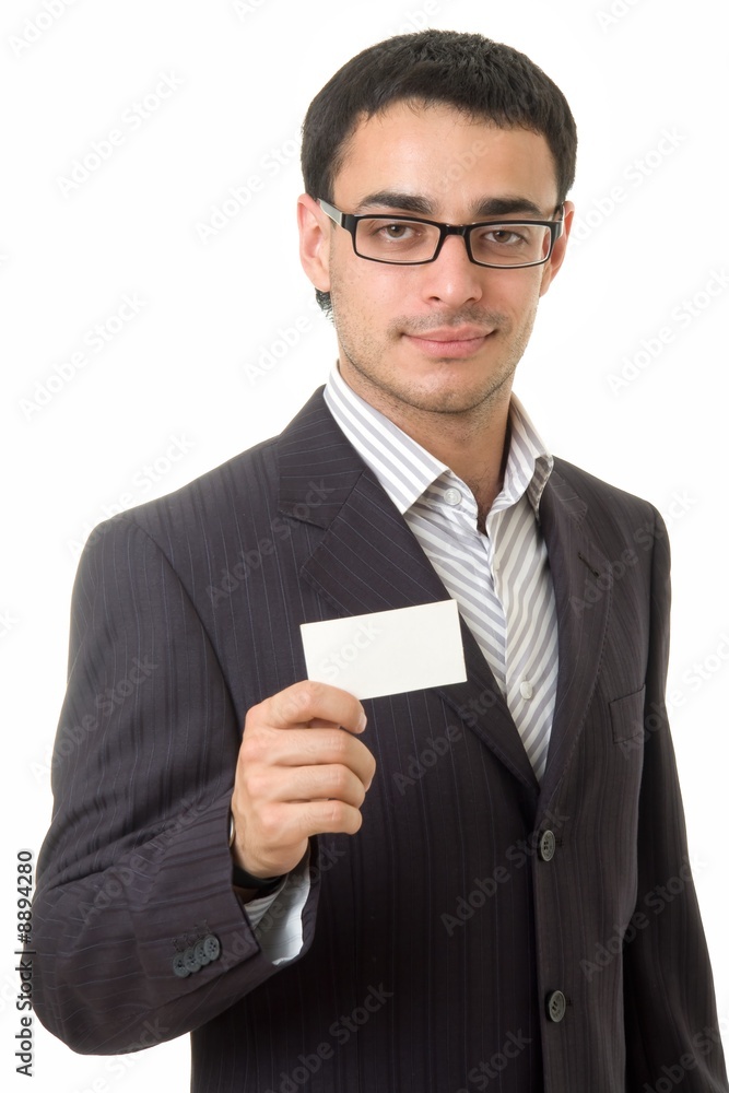 Young businessman holds an empty business card Young businessman holds an empty business card