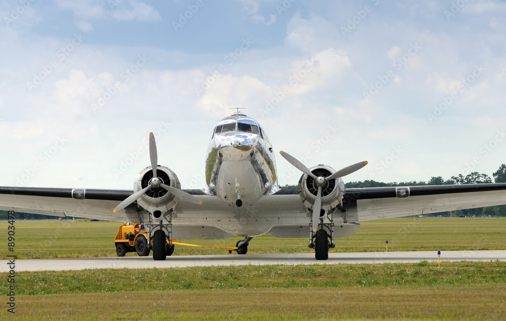 Classic turboprop airplane in silver color front view Classic turboprop airplane in silver color front view