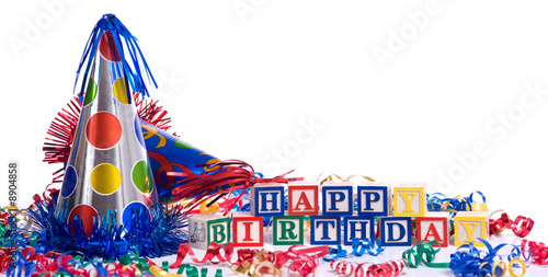 "Happy Birthday" blocks on a white background with copy space
