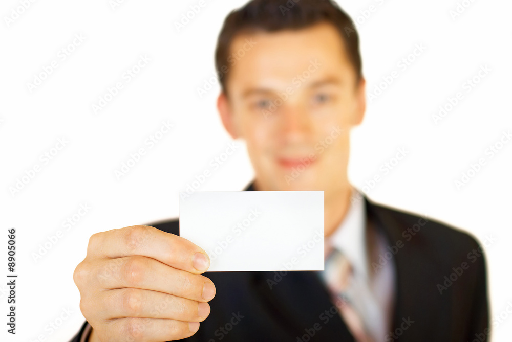 Young businessman holding blank visit card. Backside. Isolated. Young businessman holding blank visit card. Backside. Isolated.