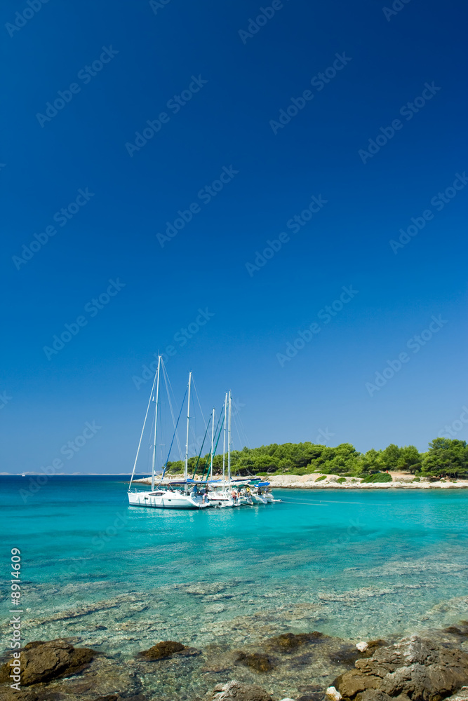 Sail boats docked in beautiful bay, Adriatic sea, Croatia