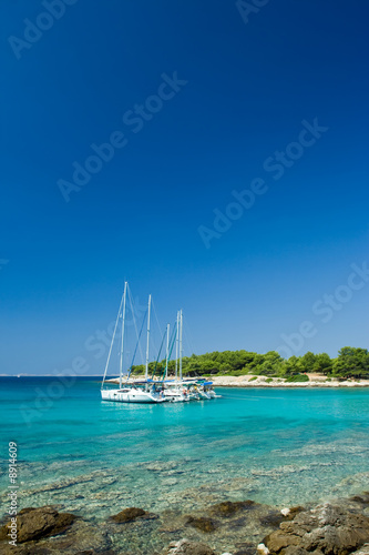 Sail boats docked in beautiful bay, Adriatic sea, Croatia