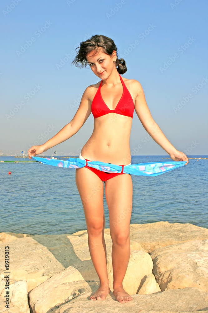 Pretty girl with pareo on the beach. Pretty girl with pareo on the beach.