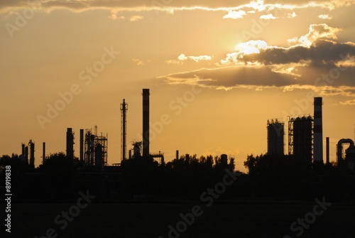 Oil refinery at sunset