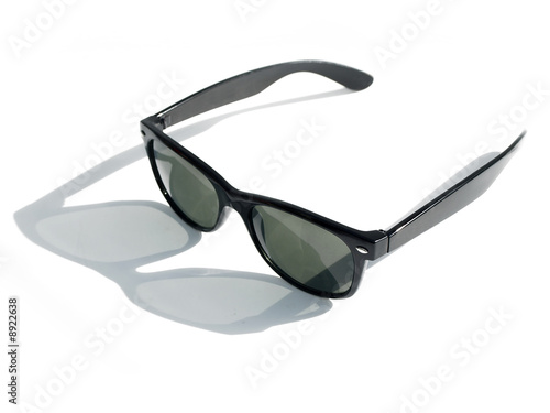 Cool retro style sunglasses with extreme film noir style shadow