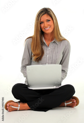 Happy young woman holding a...