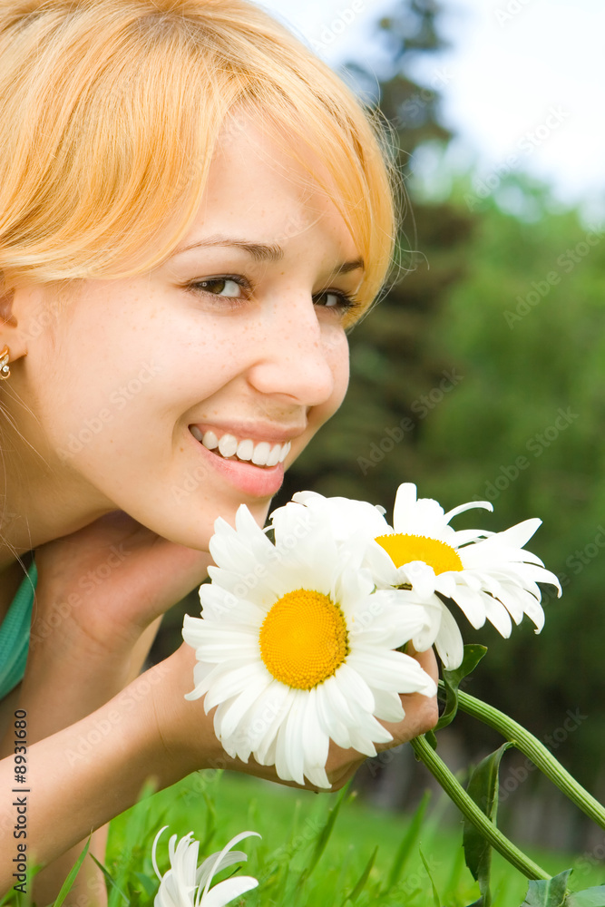 fun woman rest in the park with flowers fun woman rest in the park with flowers