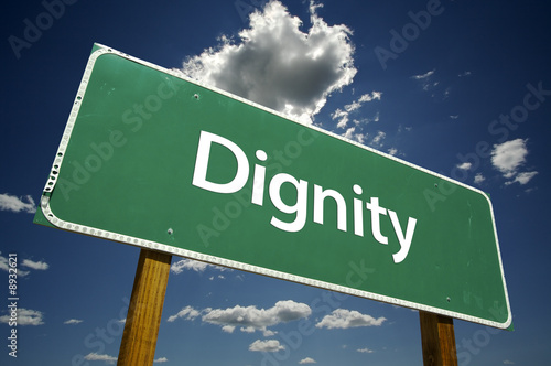 Dignity Road Sign with Dramatic Clouds and Sky. photo