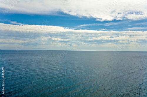 Wallpaper Mural image of blue water under the sky with clouds Torontodigital.ca