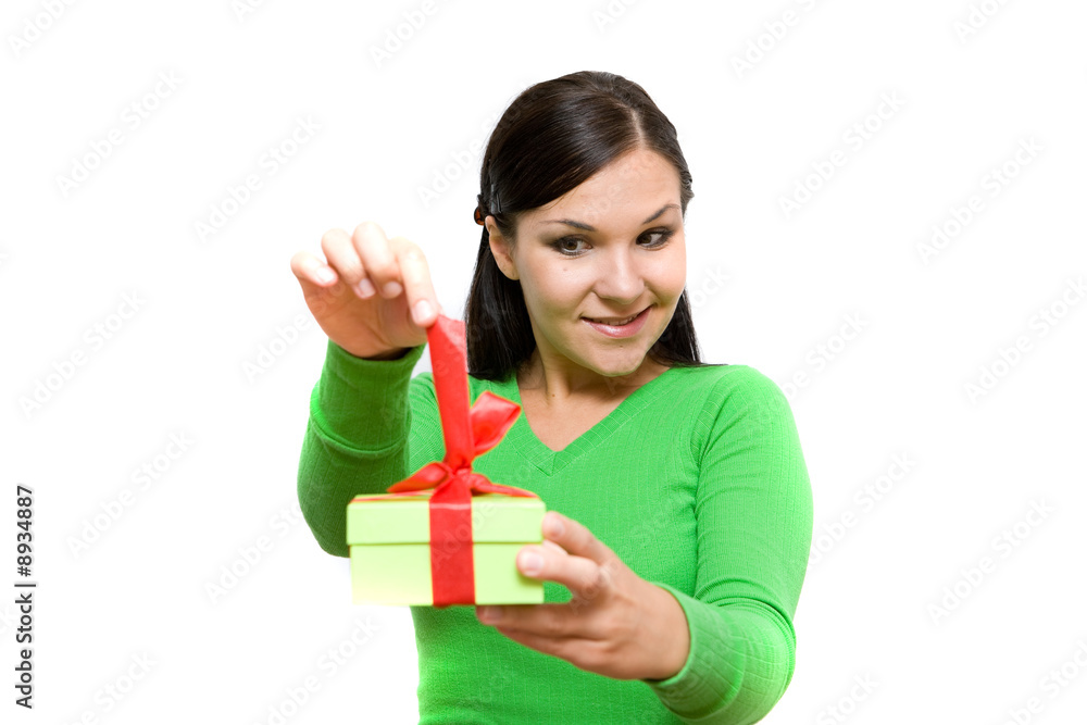 attractive brunette woman holding gift on white background attractive brunette woman holding gift on white background