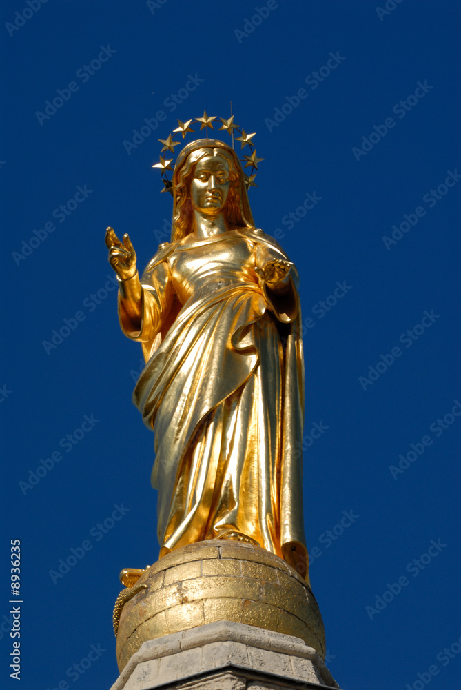 Gilded statue of the Virgin Mary at Avignon Cathedral, France