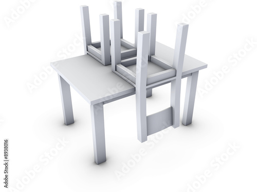 An isolated upside down chairs on table white background