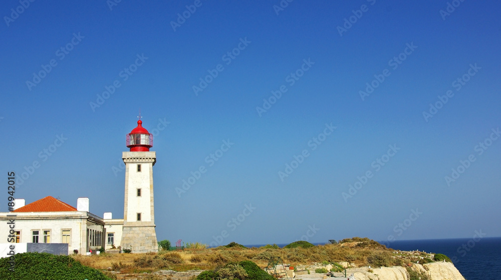 Lighthouse in the Portuguese coast, Algarve region.