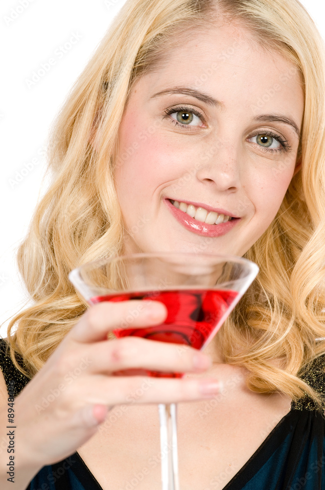 A pretty young woman holding a cocktail A pretty young woman holding a cocktail