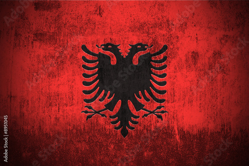 Weathered Flag Of Albania, fabric textured.. #8951045