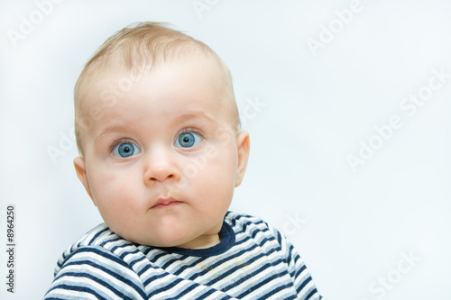 portraits of a baby boy on white background