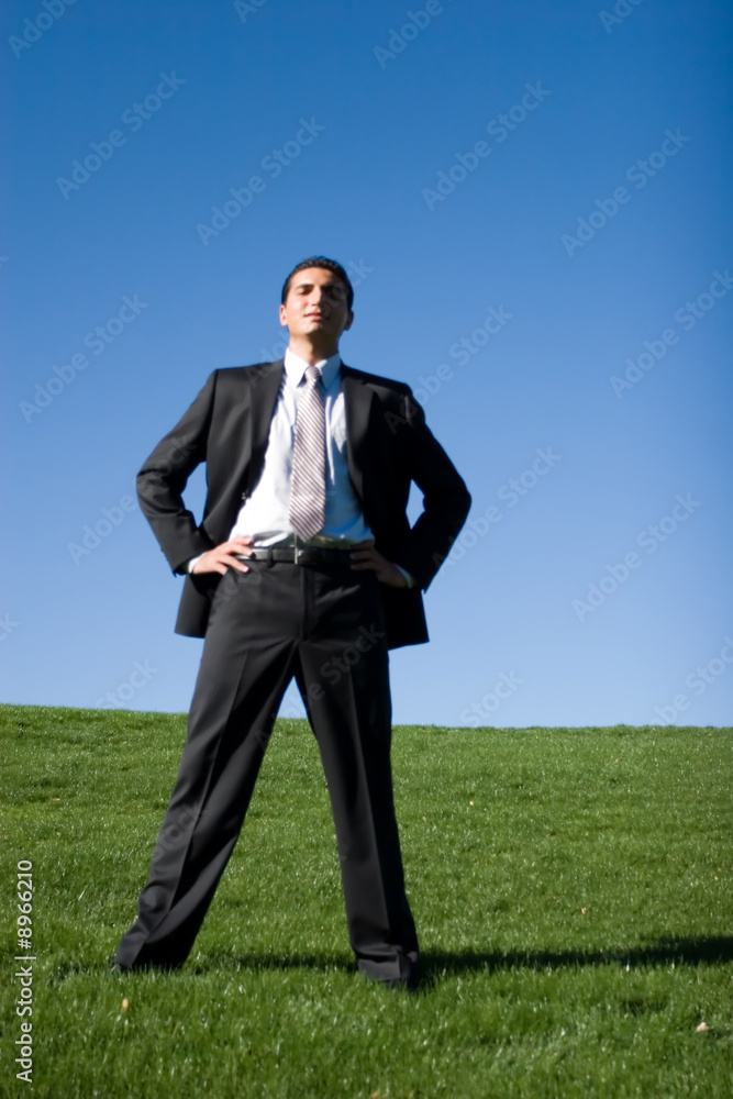 Confident businessman in dark suit. Confident businessman in dark suit.