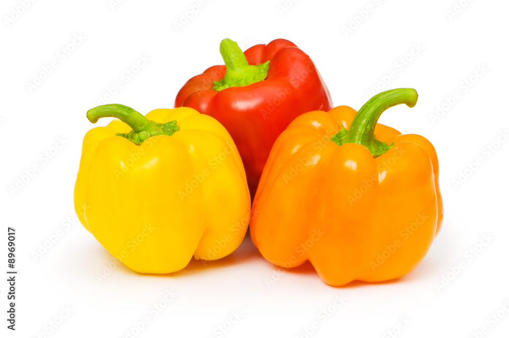 Three bell peppers isolated on the white Three bell peppers isolated on the white