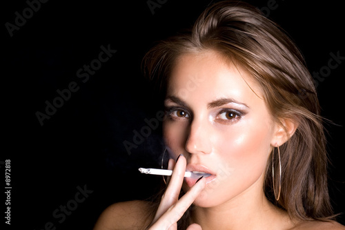 portrait of the beautiful young woman with a cigarette 3