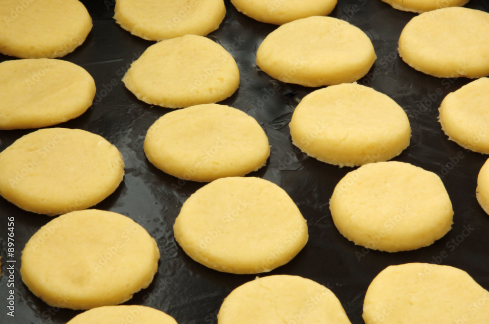 house cookies prepared before a batch as a new background