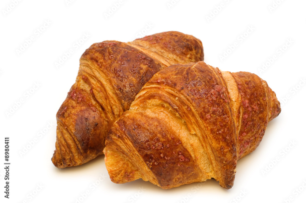 two fresh croissants on white background two fresh croissants on white background