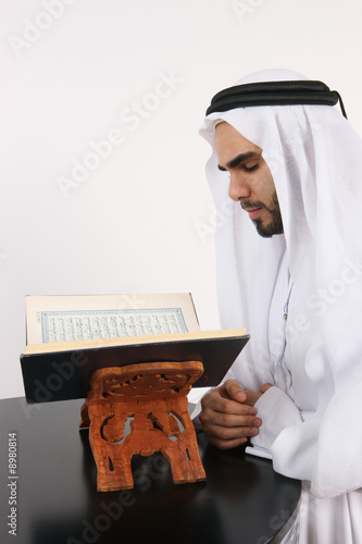 Muslim Man Reading The Holy Quran In The Holy Month Of Ramadan