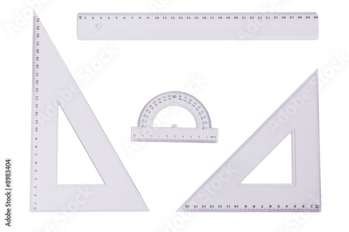 Ruler, squares and a protactor on a white background. photo