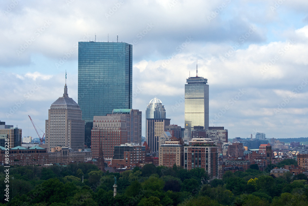 the morning sunrise in boston makes the skyline look metallic
