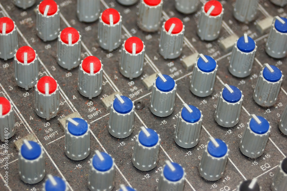 Muscial equipment - Mixer with red and blue knobs Muscial equipment - Mixer with red and blue knobs