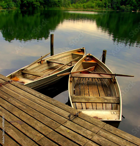 Two old rowing boats on a lake