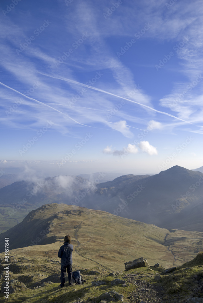 Obraz premium Female hiker on Bowfell