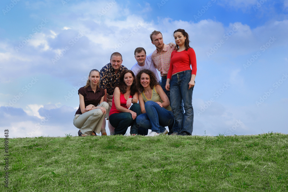 A group of friends against sky A group of friends against sky