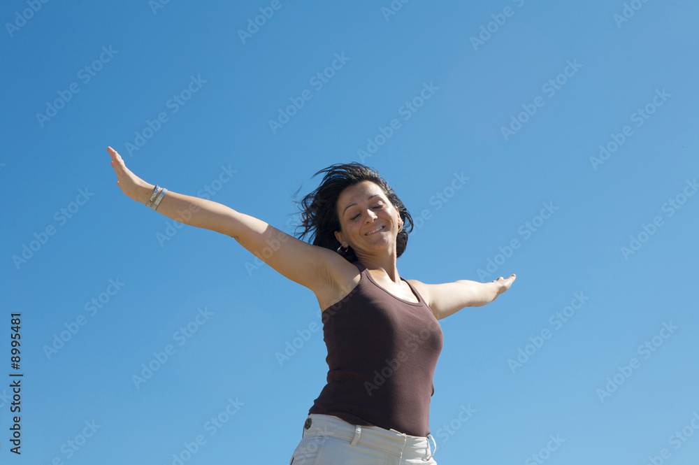 Photo of woman relaxing with sky background Photo of woman relaxing with sky background