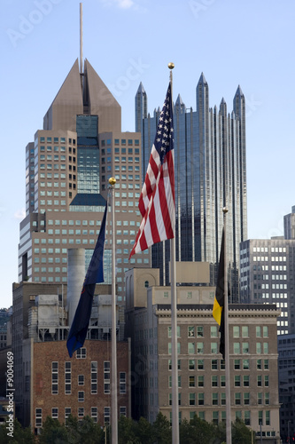 American Flags Near City Buildings