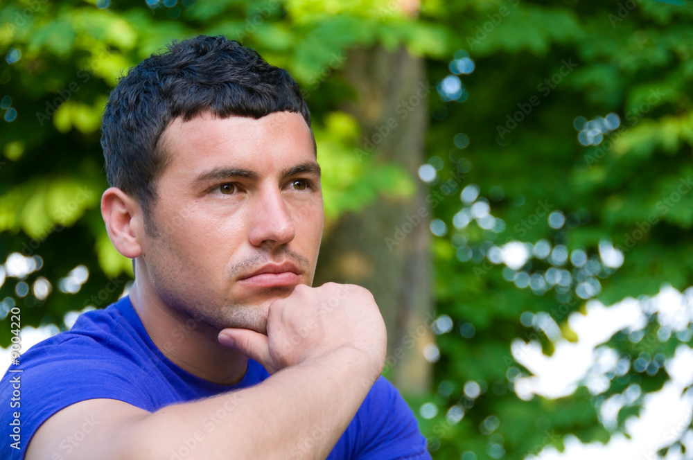 Male model posing outdoors Male model posing outdoors