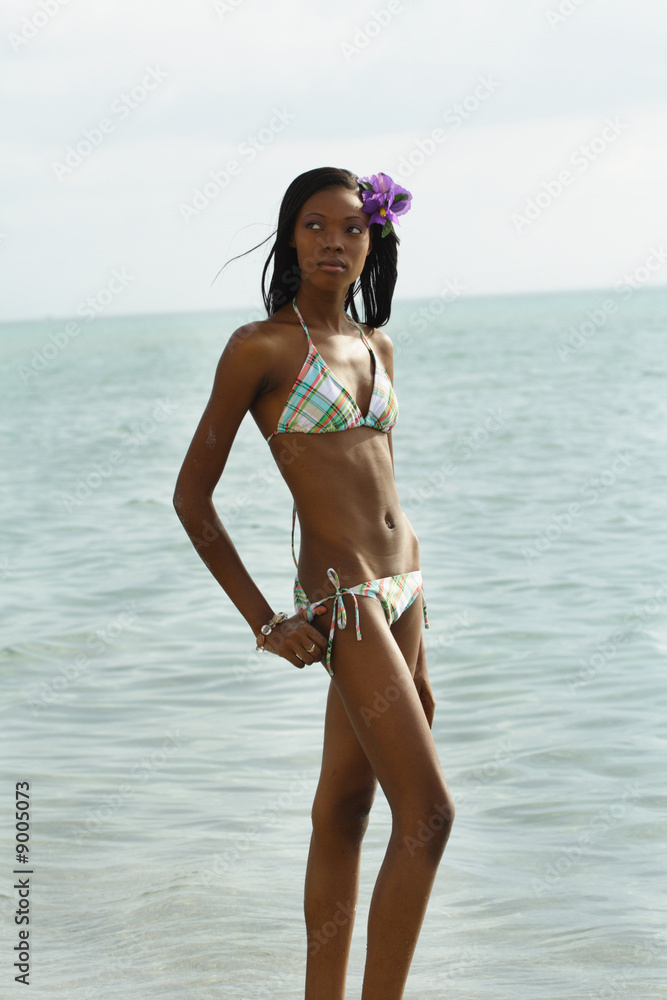 Skinny woman in a bikini Stock Photo