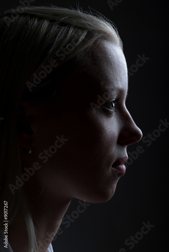 low key portrait of young lady