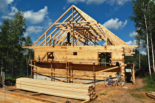 Construction of the country house from a bar on a country site