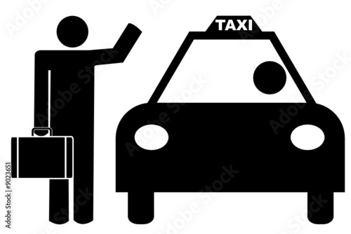 man with luggage hailing a taxi cab