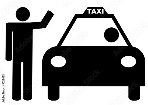 person with arm up hailing a taxi
