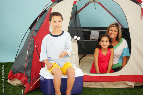 Family In A Tent On Their C...