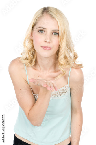 A casual young girl blowing a kiss © EastWest Imaging