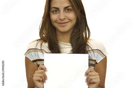 Young, teen  girl holding a sign and smiling