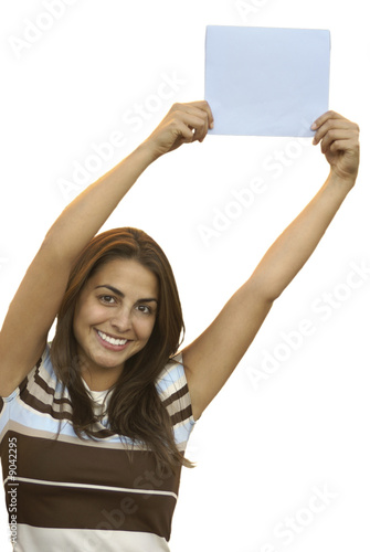 Young, teen  girl holding a sign above head and smiling